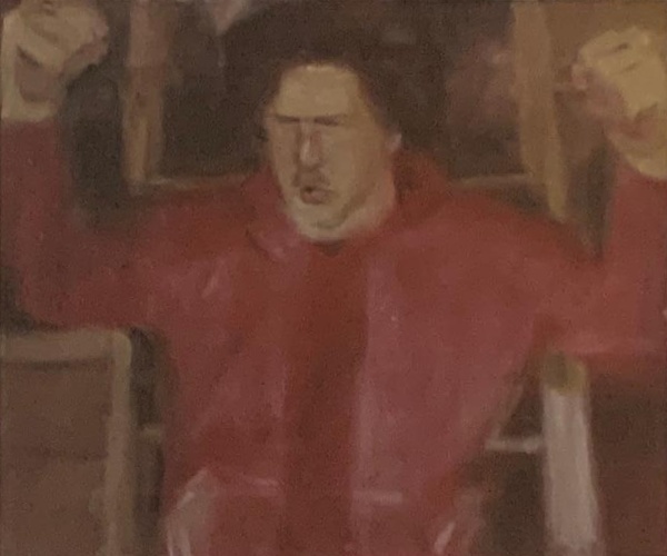James Doing the Machoman: painted portrait in a red shirt with raised fists