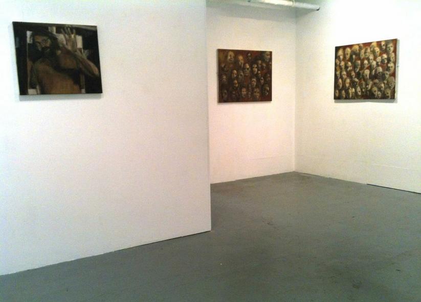 Historical installation photograph of paintings on the white walls of Transition Gallery